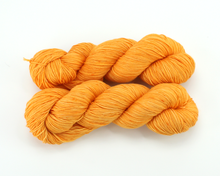 Load image into Gallery viewer, Pumpkin—Hand-Dyed Yarn (fingering, dk, worsted and bulky weight yarn)
